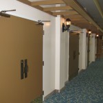 These were in the lobby but they illustrate my pet peeve about closers on the wrong side of the door.