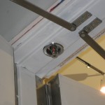 Sprinkler heads between the doors.