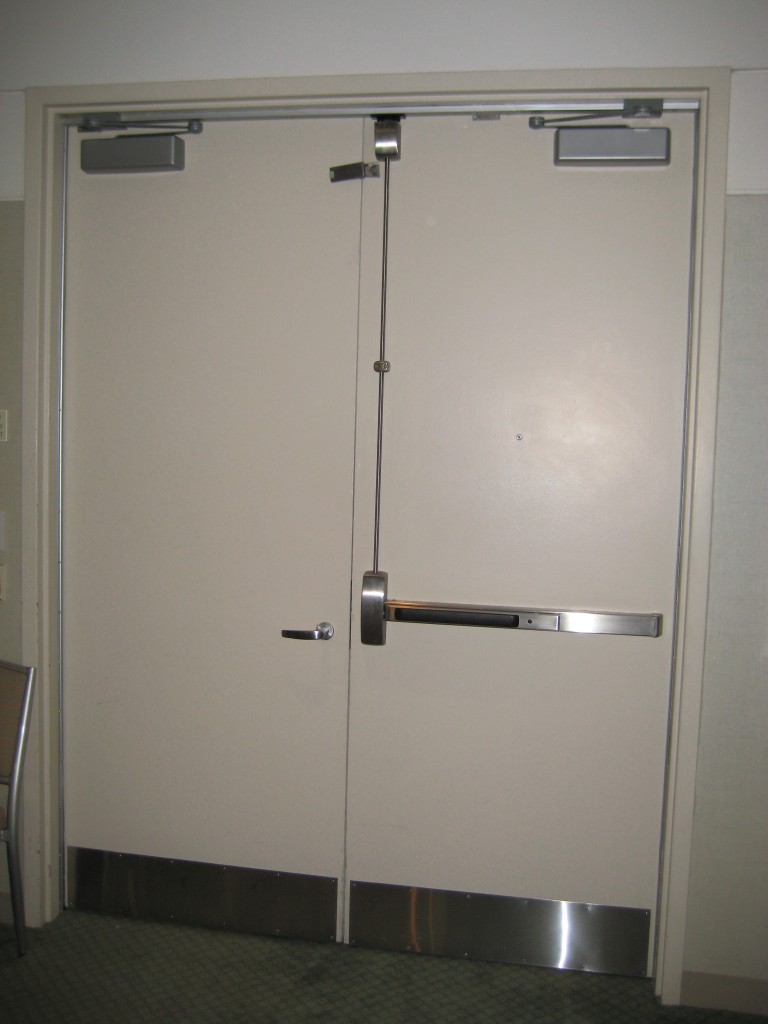 Pair with mortise lock and vertical rod exit device.